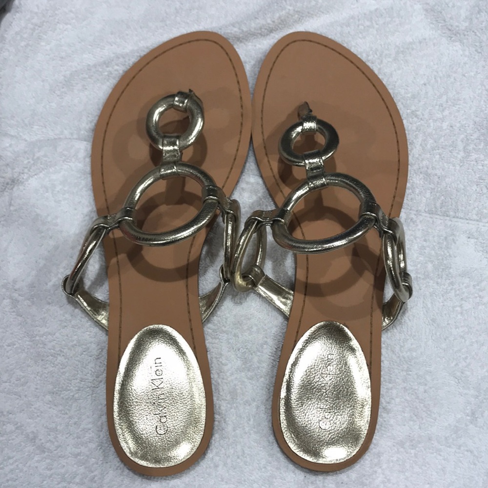 Used Calvin Klein Jacky gold sandals Size 9M
